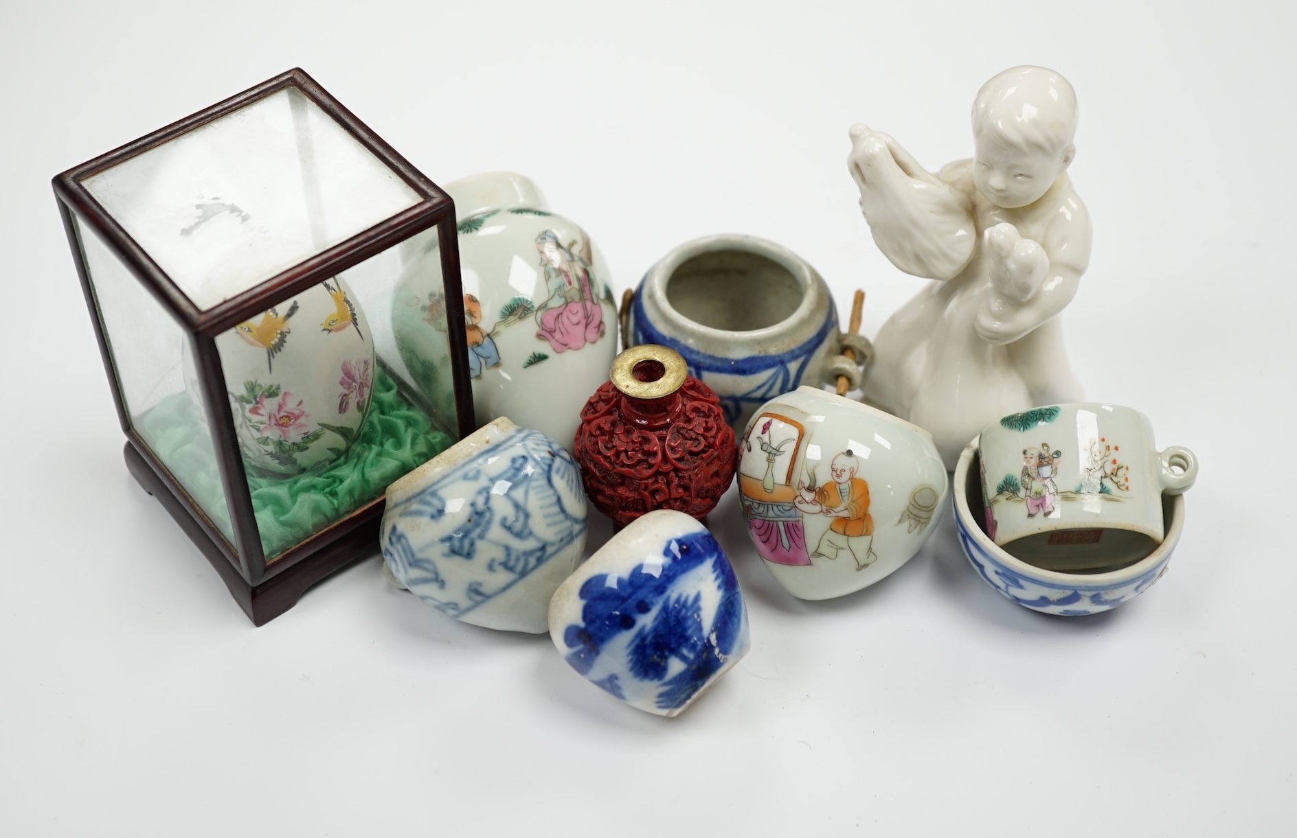 A group of small Chinese bowls, a blanc de chine figure, a cinnabar lacquer miniature vase, etc. largest 9cm high